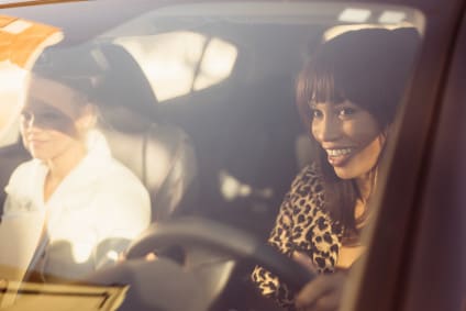 Two women ride sharing