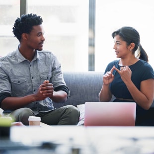 Planning, teamwork and mentor with business people in meeting for strategy, project management or creative. Entrepreneur, brainstorming and diversity with employee in startup for design collaboration.