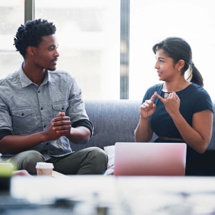 Planning, teamwork and mentor with business people in meeting for strategy, project management or creative. Entrepreneur, brainstorming and diversity with employee in startup for design collaboration.