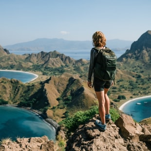 Woman looking at mountains and lakes, BNP Paribas biodiversity