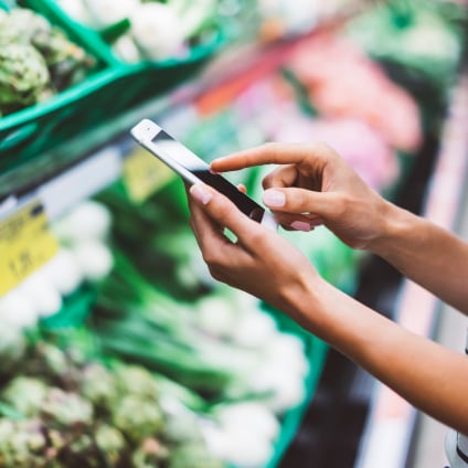 Woman using an application to chose food