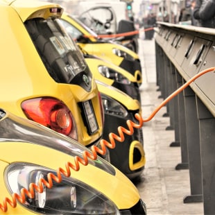 Power supply for electric car charging. City electric car charging station. Close-up.